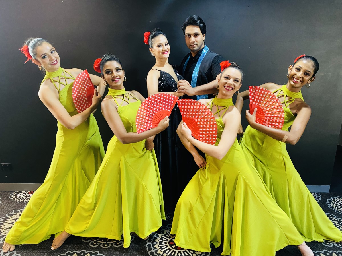 Shashila Dance Theater performers in yellow costumes